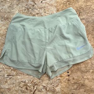 Nike women’s running shorts NWT light green size small back pocket